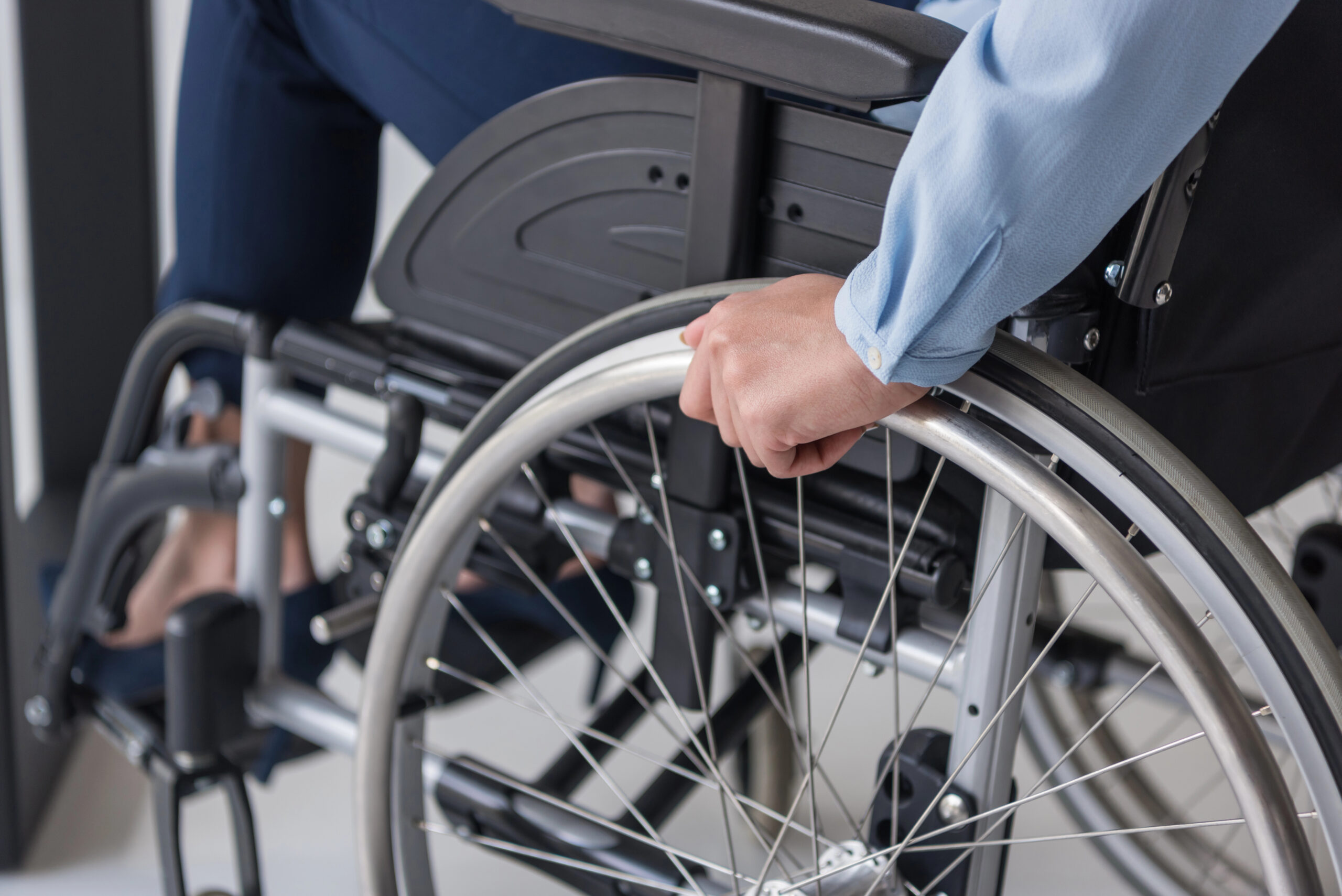 Rehabilitation and future care cost review - person in a wheelchair