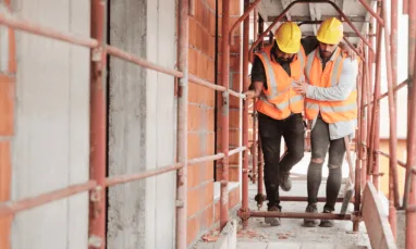 Crane collapse injury case review - Construction workers in construction site