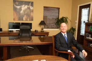 Legal help after severe dog bite - Greg Baumgartner in his office