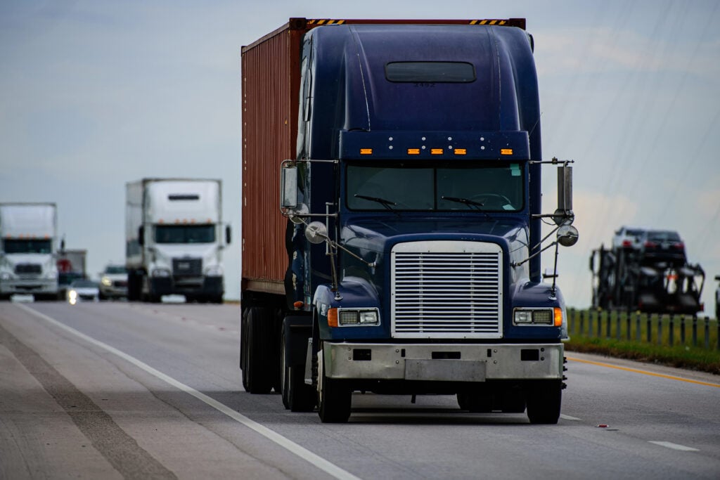 An 18-Wheeler on a busy highway
